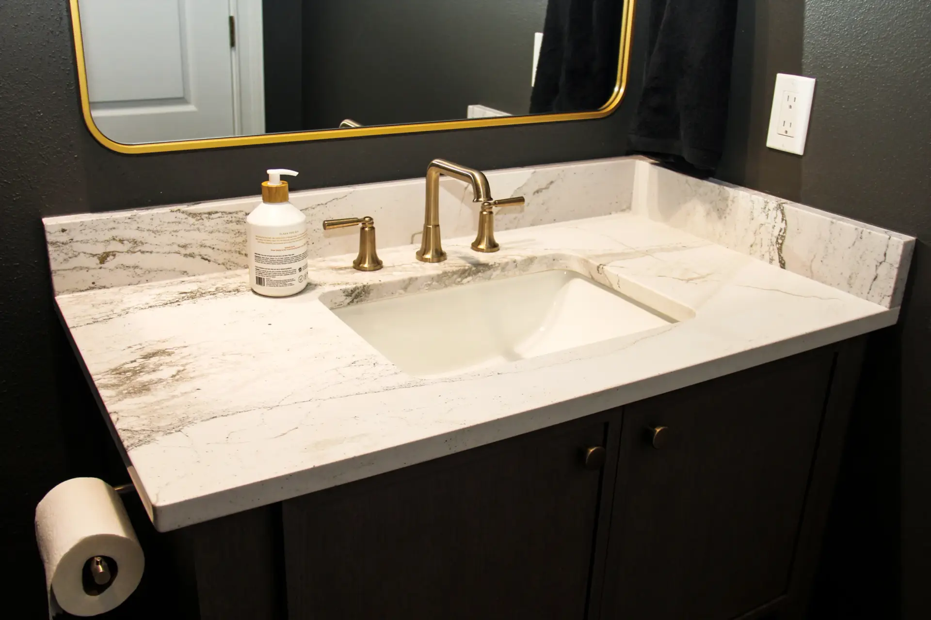 Recently renovated bathroom by Kirkplan Kitchen & Bath, part of a full home remodeling project in Sarasota, using Cambria quartz.